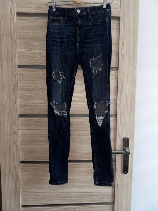 Spodnie z dziurami granatowe