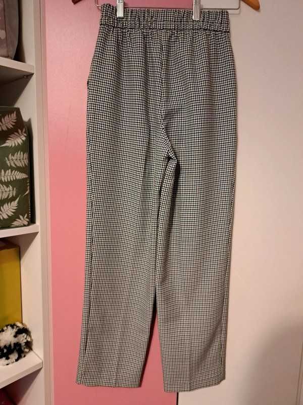 Spodnie dziewczęce Primark r. 32 pepitka