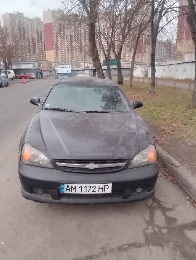 Шевроле Еванда 2.0