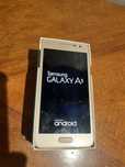 Samsung Galaxy A3 złoty, kabelek i kartonik
