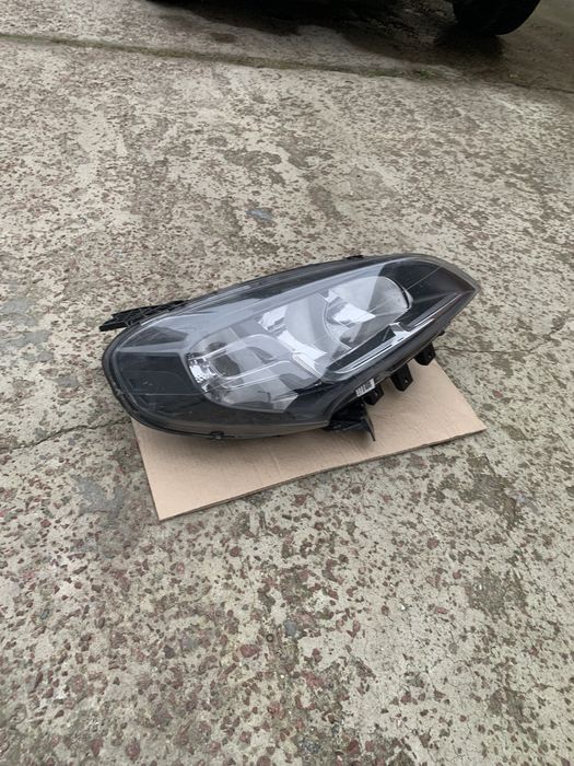 Права фара Fiat Doblo оригінал чорна фіат добло