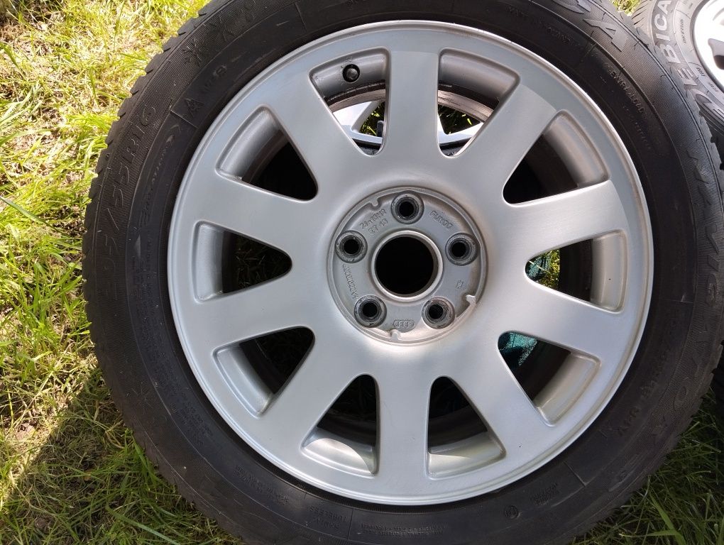 Felgi z oponami wielosezonowymi audi 5x112