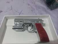 Pistola de choque de brincar
