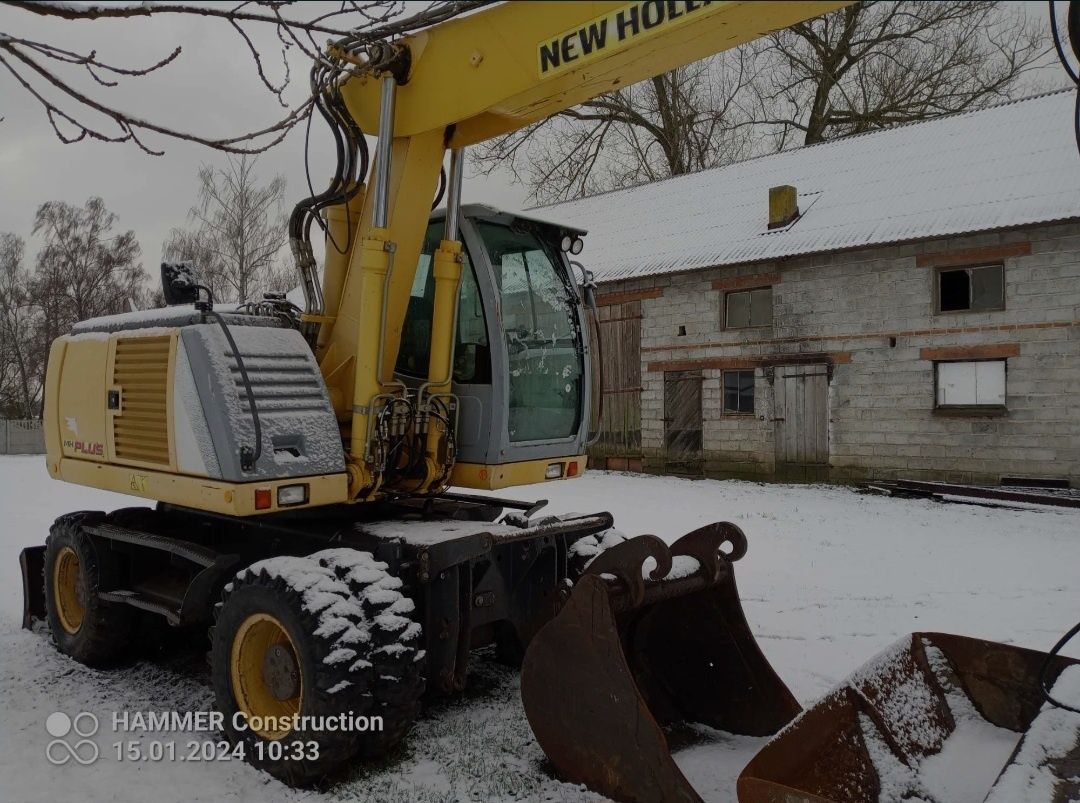 Koparka kołowa New Holland mh plus 5.6