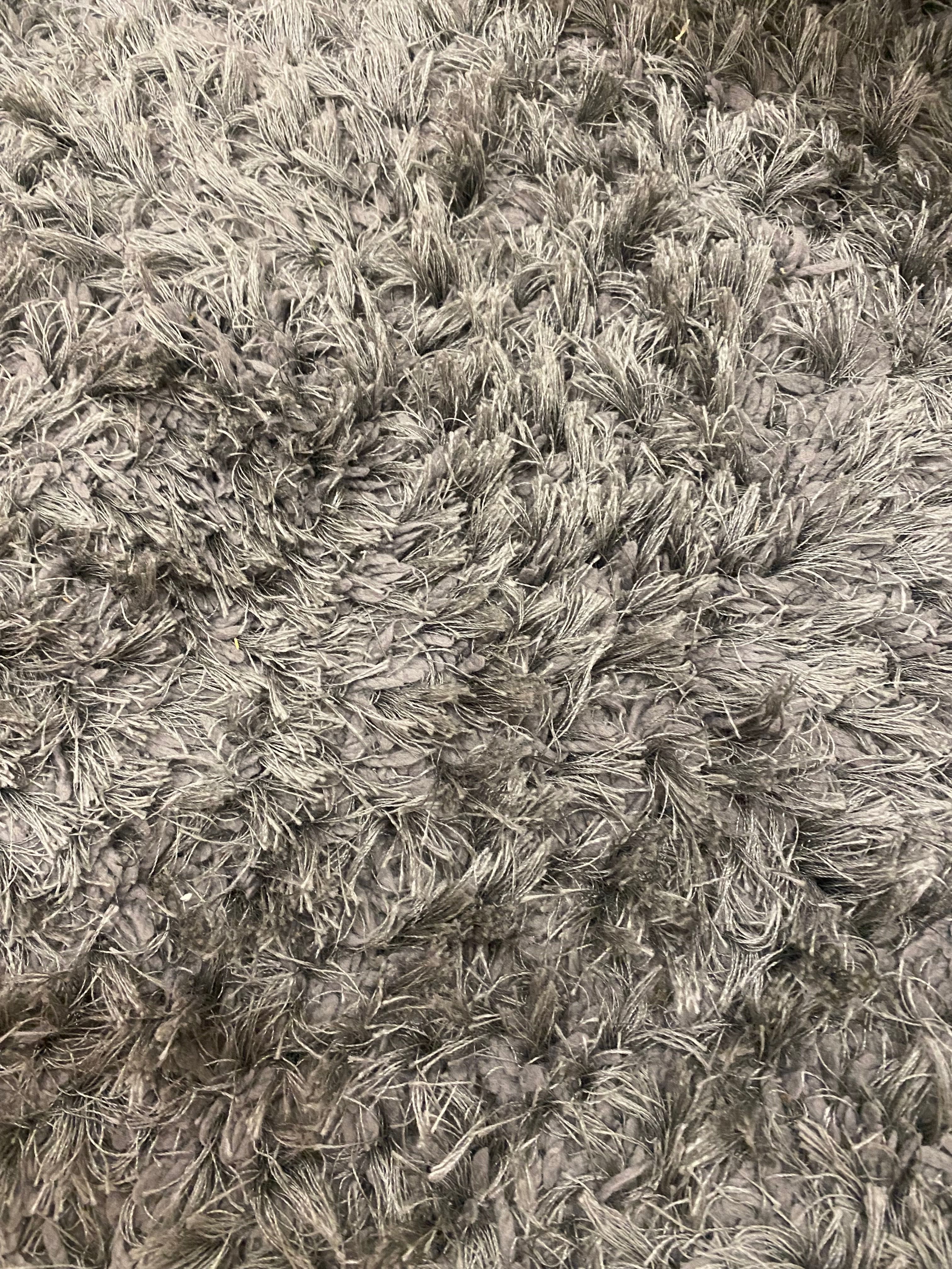 Tapete cinzento para quarto ou sala