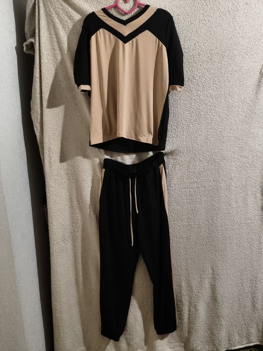 Продам новый женский костюм