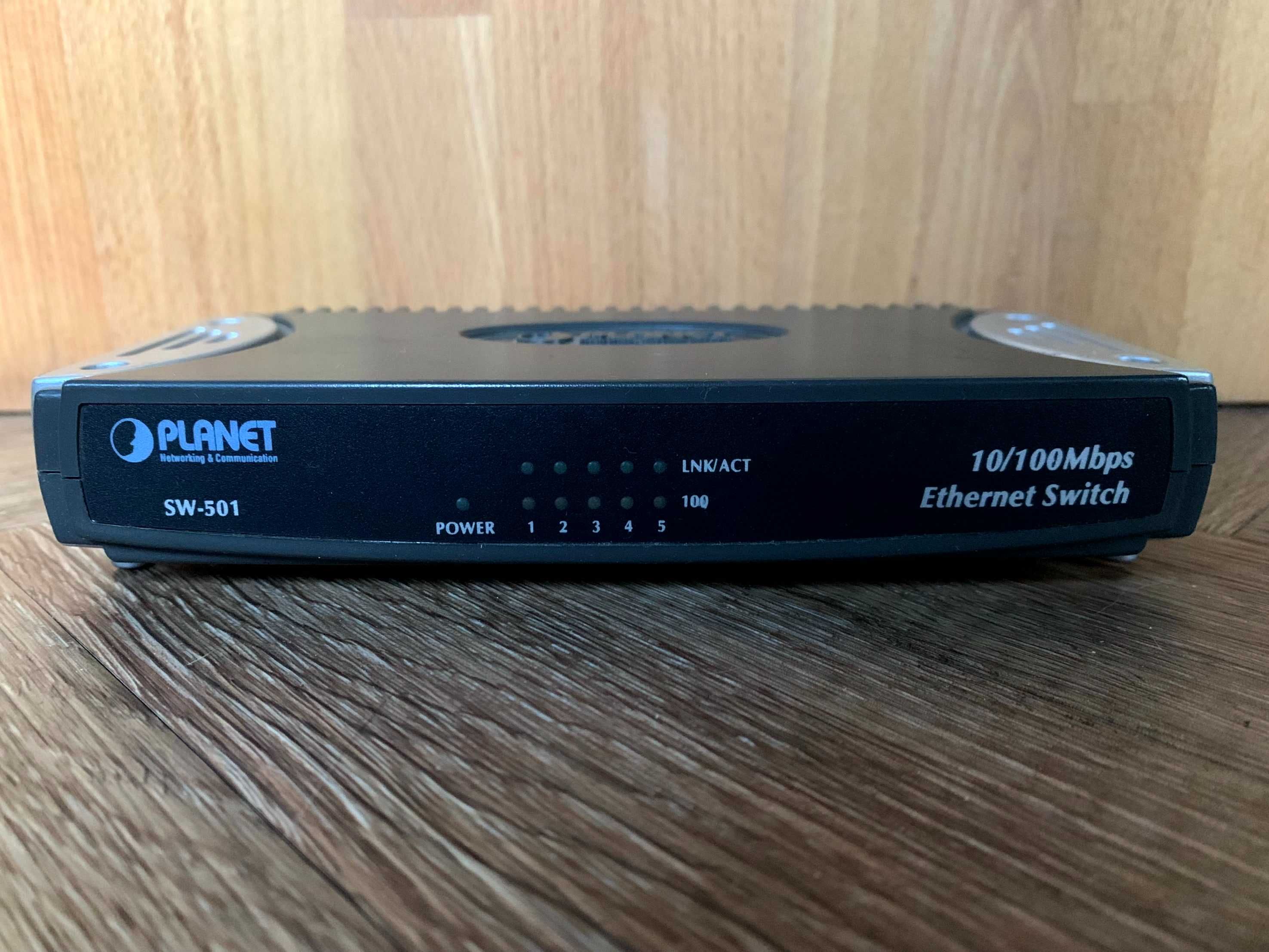 Planet SW-501 ethernet switch z zasilaczem sprawny 12V DC 500 mA BDB