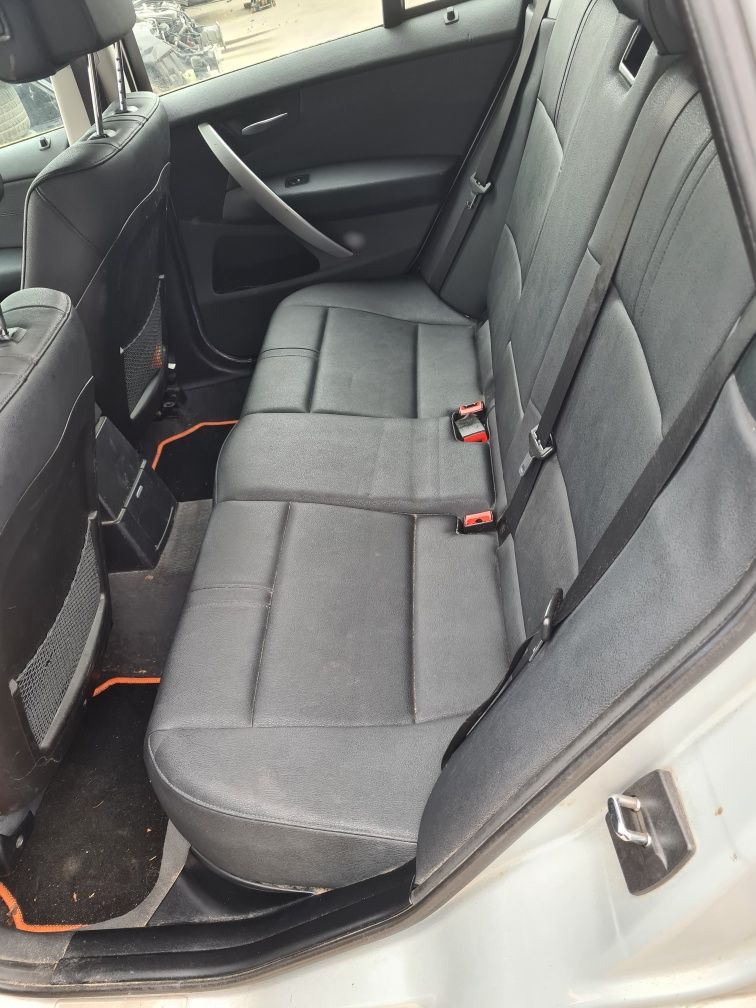 Fotele kanapa boczki skora BMW X3 E83 grzane