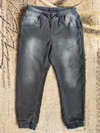 Spodnie jeansowe chłopięce rozm.128 Reserved