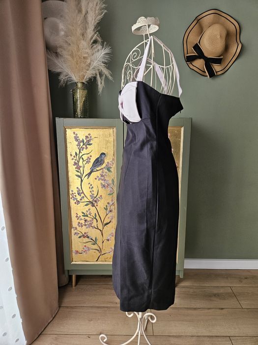 Elegancka sukienka damska midi  Mohito z kokardą i wycięciem wesele