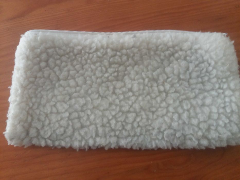 Bolsa em pele de carneiro