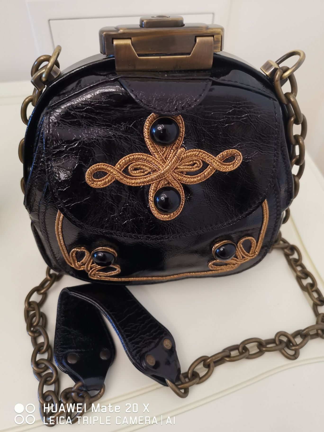 Дизайнерські чоботи та сумка Anna Sui