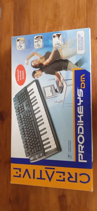 Teclado c/ piano