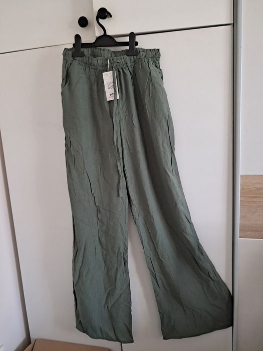 Nowe spodnie z szerokimi nogawkami, zielone r.S/M