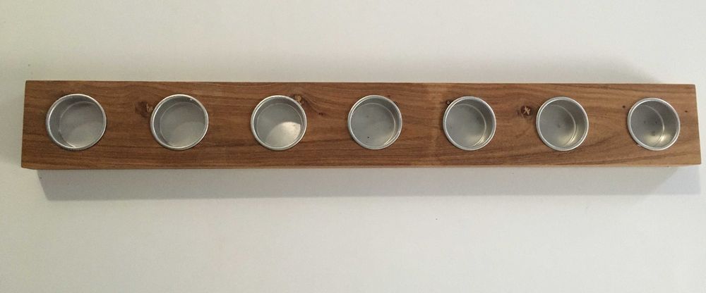 porta velas em madeira maciça