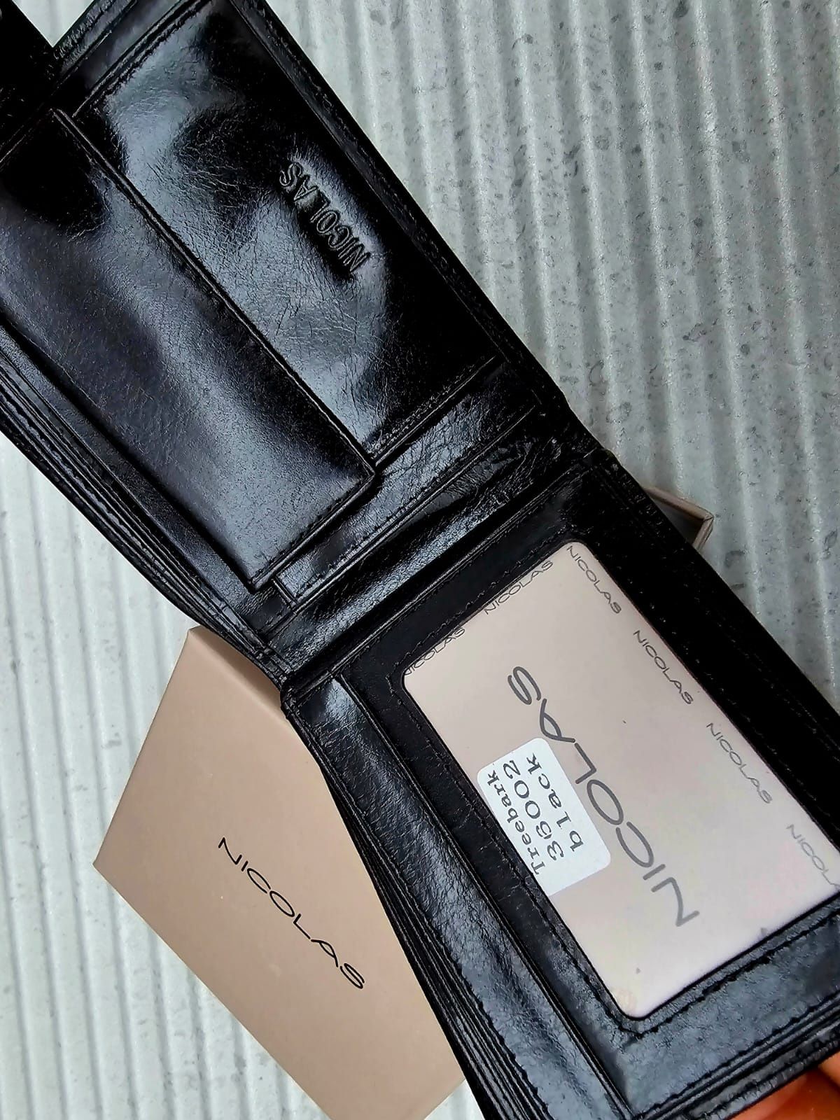 Modny portfel męski skórzany marki Nicolas czarny nowy