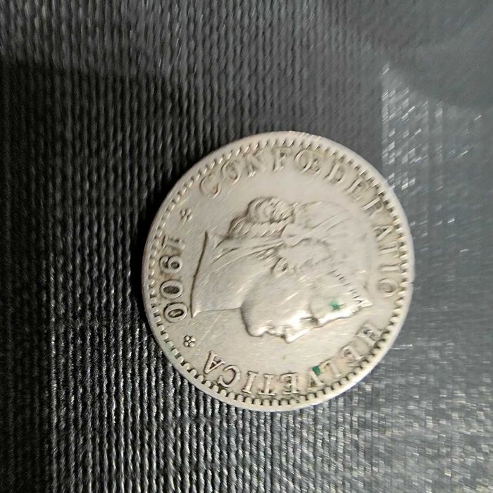 "Elegância do século XIX: coleção exclusiva de moedas suíças antigas".