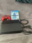 Playstation 4 com comando e jogo