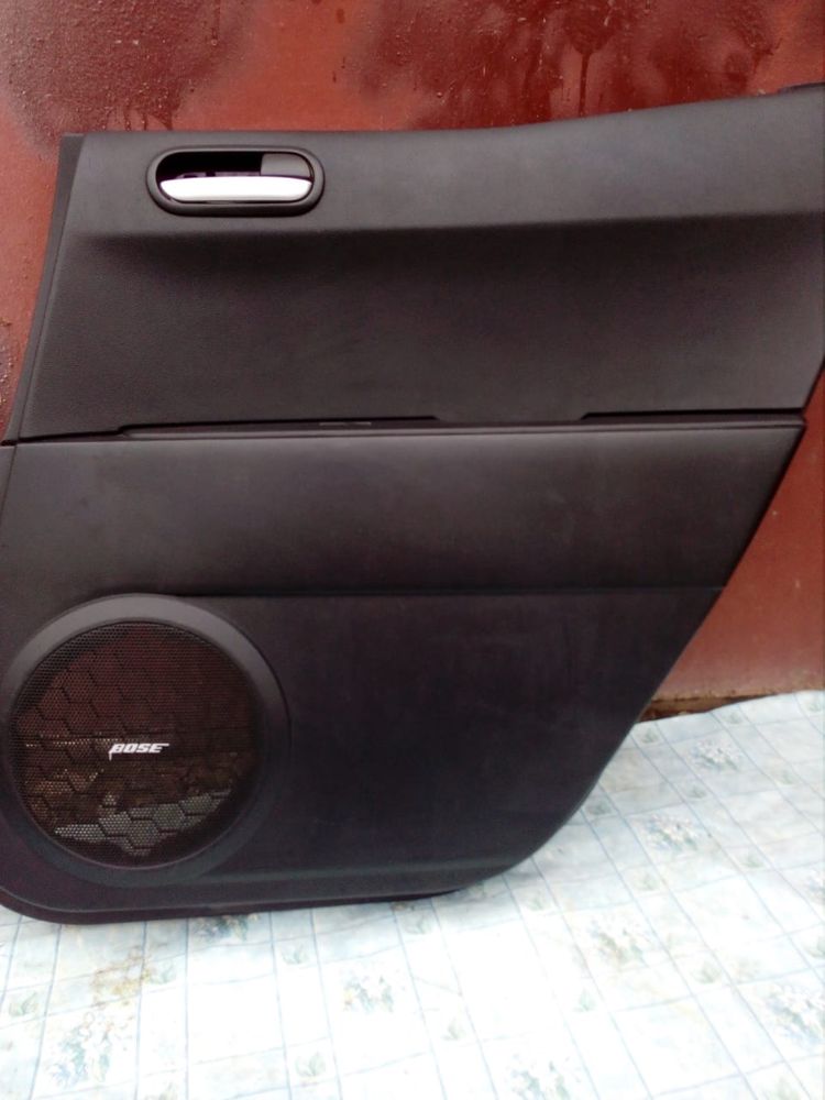 Продам дверные карты mazda cx7