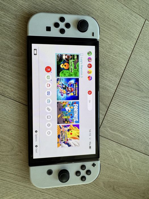 Nintendo Switch OLED + Mario Rabbids Sparks of Hope