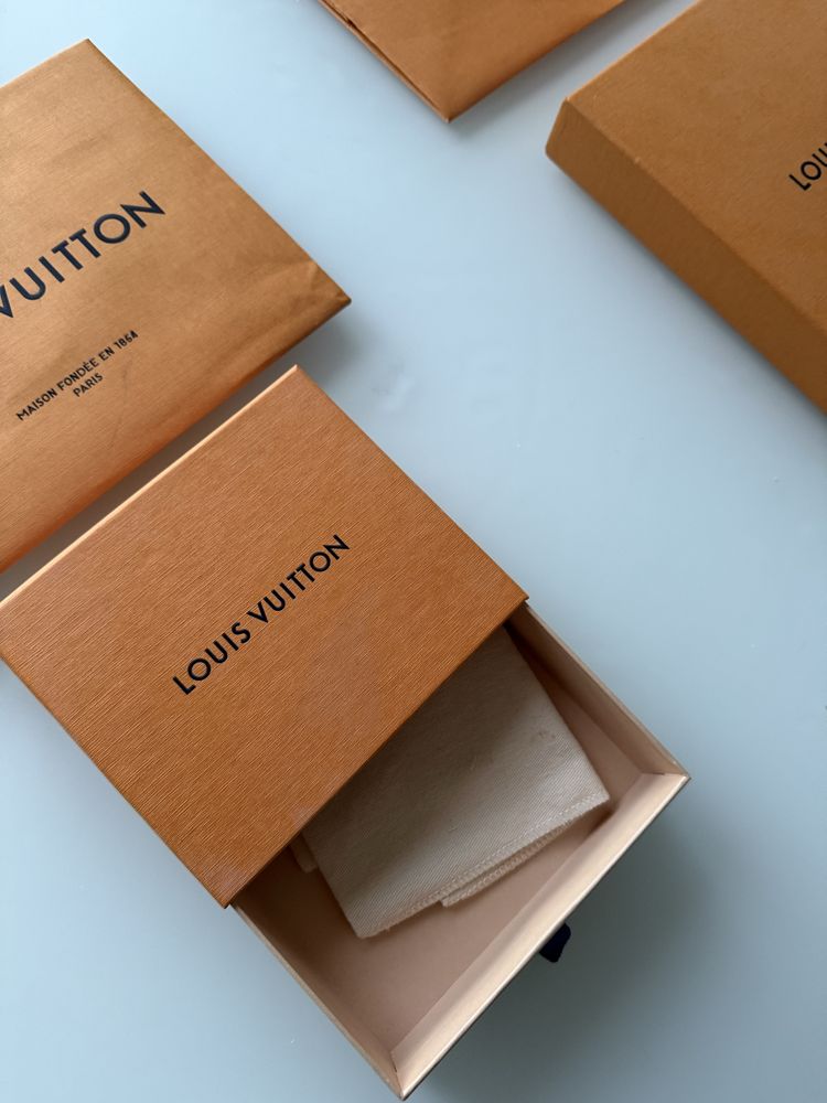 Torebki i pudełka Louis Vuitton
