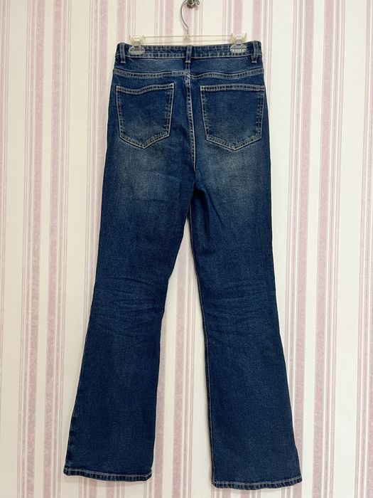 Жіночі джинси кльош