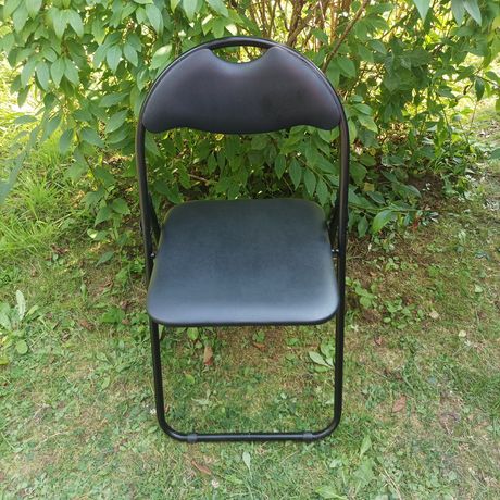 Krzesła składane w kolorze czarnym wyściełane, 4 sztuki jak nowe