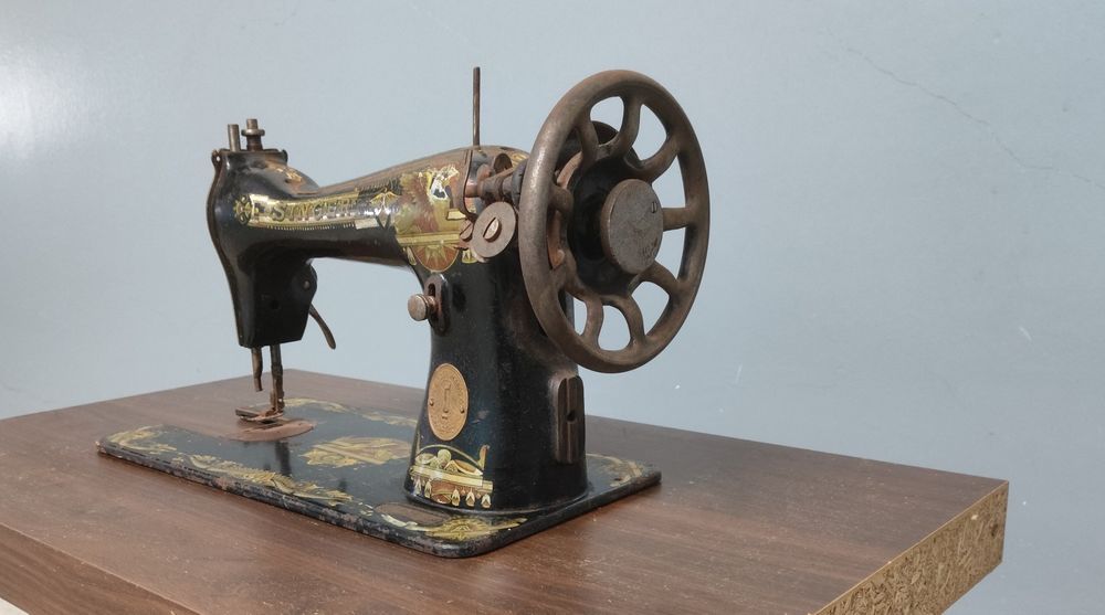 Cabeça de máquina de costura Singer