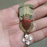 Antiga medalha  condecoração