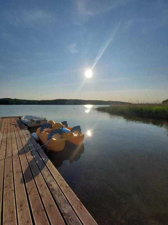 Domek Mikołajki z własną plażą, pomost, łódka Szary domek Mikołajki