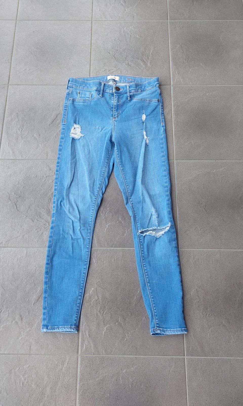 Spodnie jeansy rurki  skiny dziury wyższy stan S/M