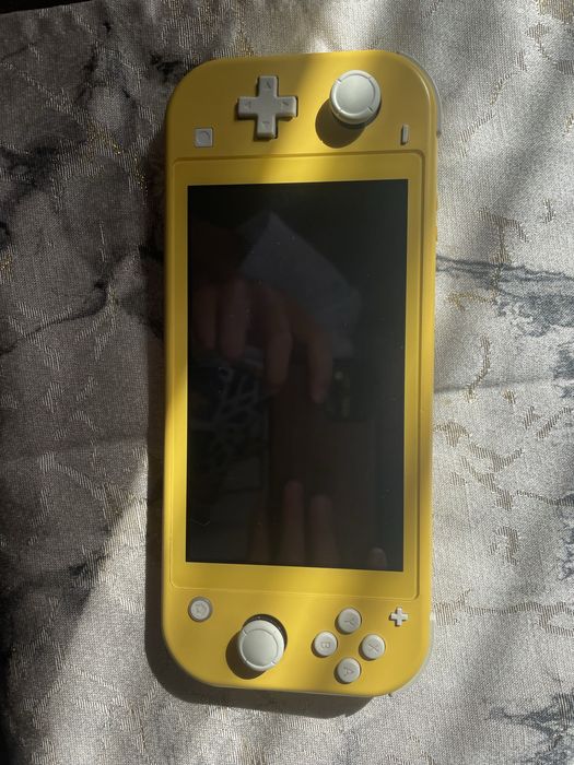 nintendo switch lite żółta+ 9 gier