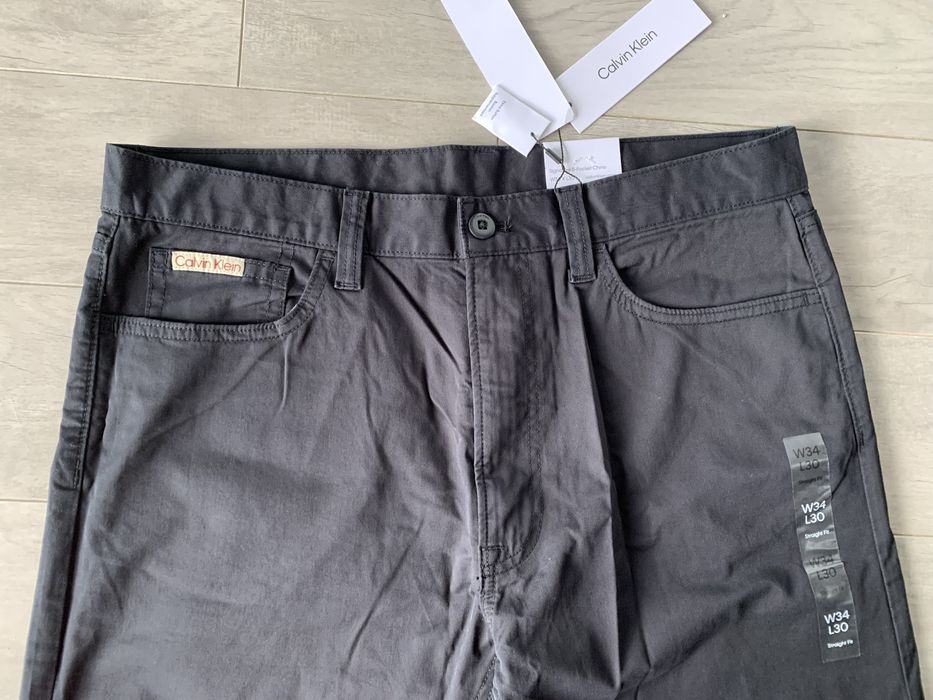 Spodnie meskie Calvin Klein chinosy 34W 30 L