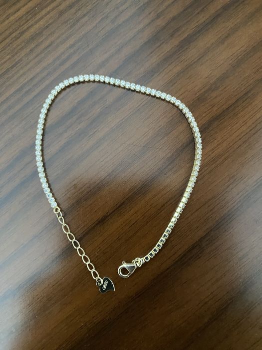 Pulseira prata dourada com zirconias. Novo