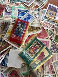 Vários lotes de 100 selos antigos da Áustria