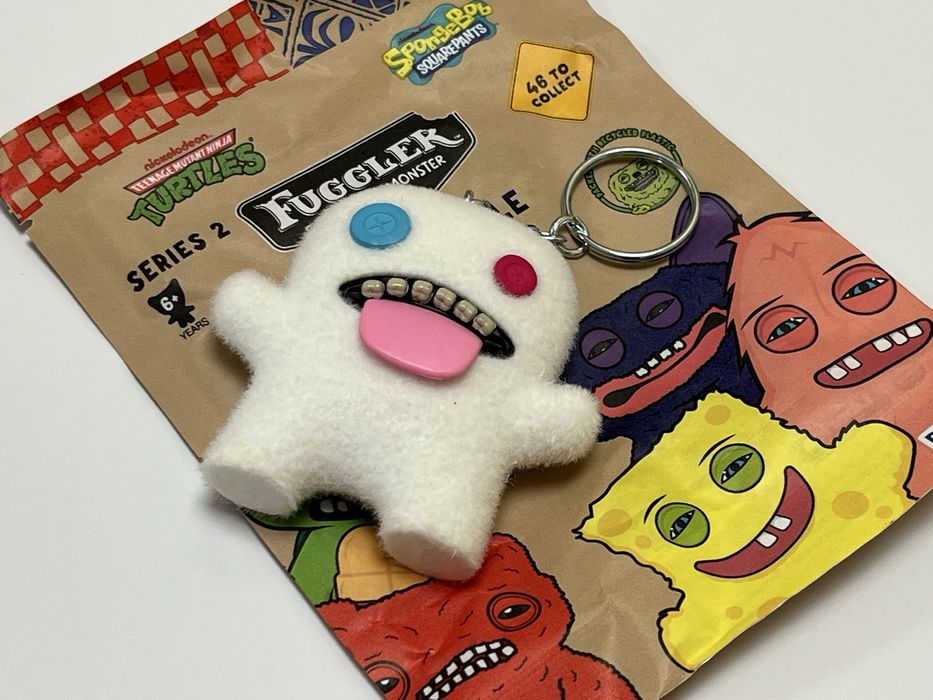 Білий пухнастий Фуглер. Брелок Fuggler White Tongue 6 Rare. 380грн