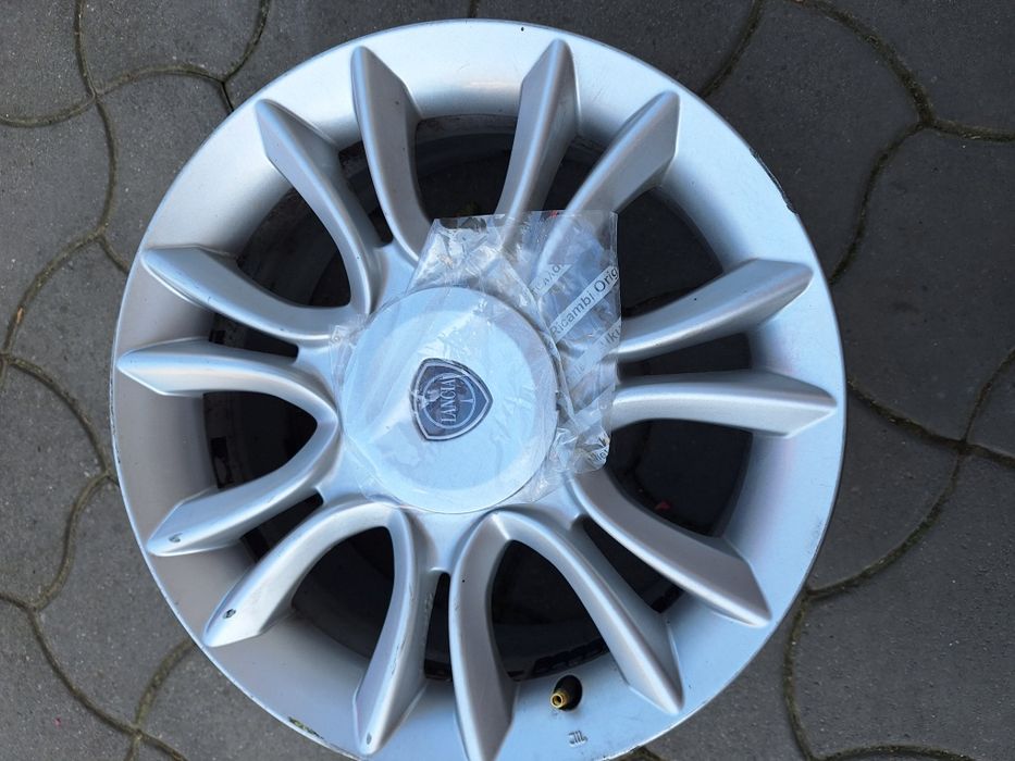 Felga alu lancia delta 4x98 ori z dekielkiem pasuje też do Fiata bravo