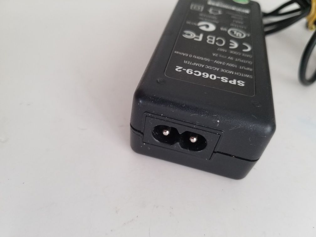 Блок питания адаптер зарядка SPS-06C9-2 9V 2A 9В 2А 3,5Х1,7 mm