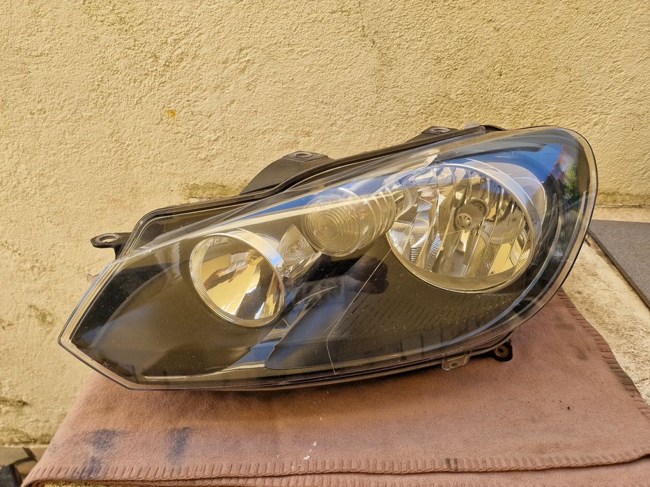 Farol esq. Vw Golf 6