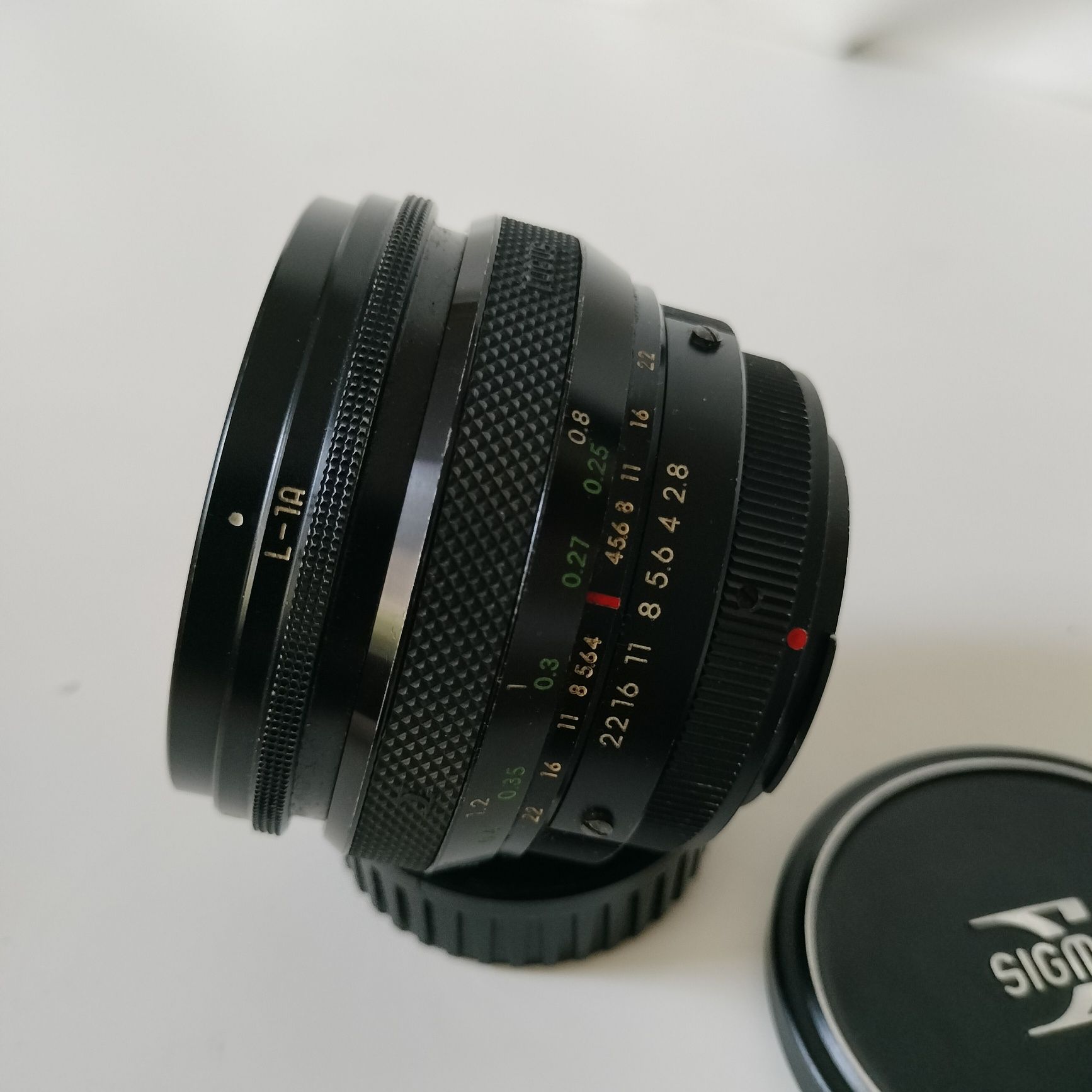 Sigma-XQ Filtermatic  multi-coated 24mm 1:2.8 M42