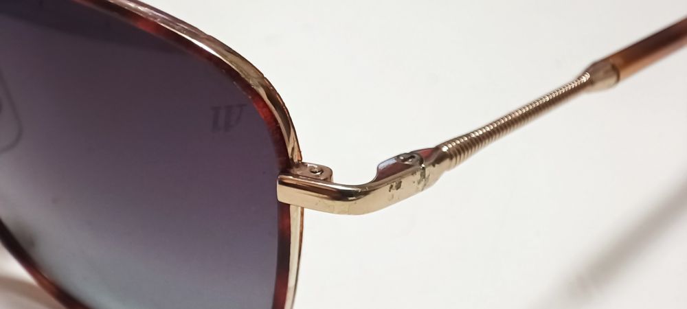 Óculos Polaroid e Web