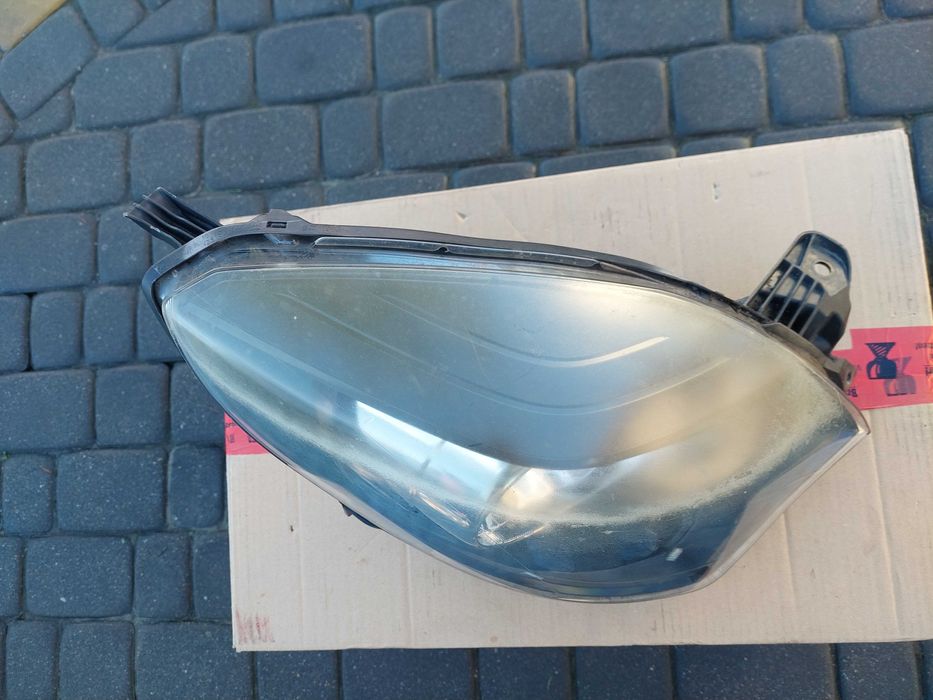 Lampa Przednia PRAWA RENAULT TWINGO II LIFT 2012- Europa Oryginał