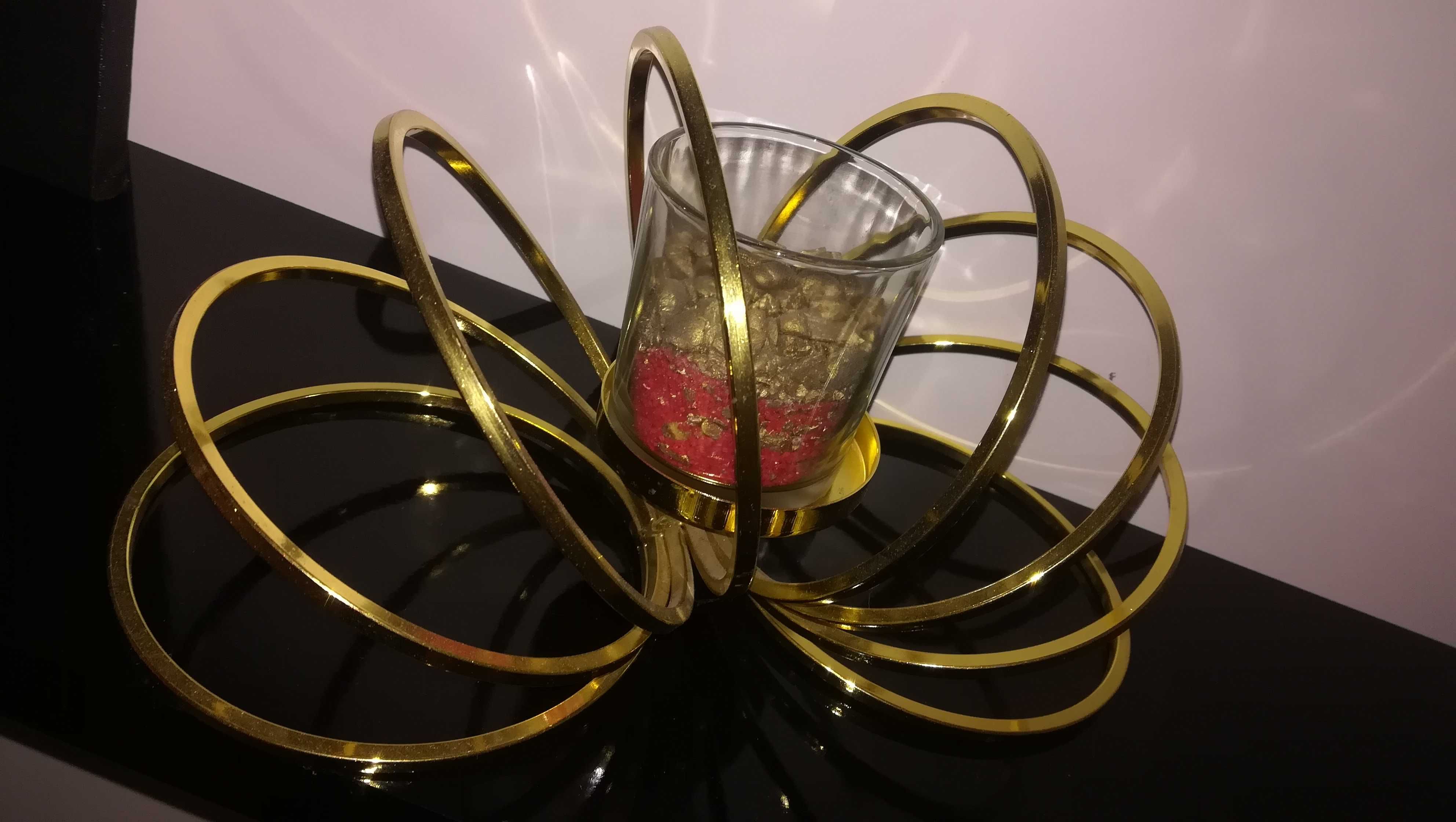 Porta velas decorativo em dourado