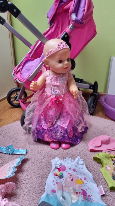 Wózek, lalka typu baby born, wanienka, zestaw ubranek i akcesoria