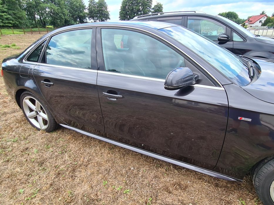 2szt LISTWY SLINE progowe LEWA +PRAWA Audi A4 B8 2009r LZ7L