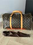 Nowa torba podróżna Louis Vuitton.