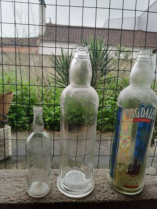 Garrafas de vidro grandes