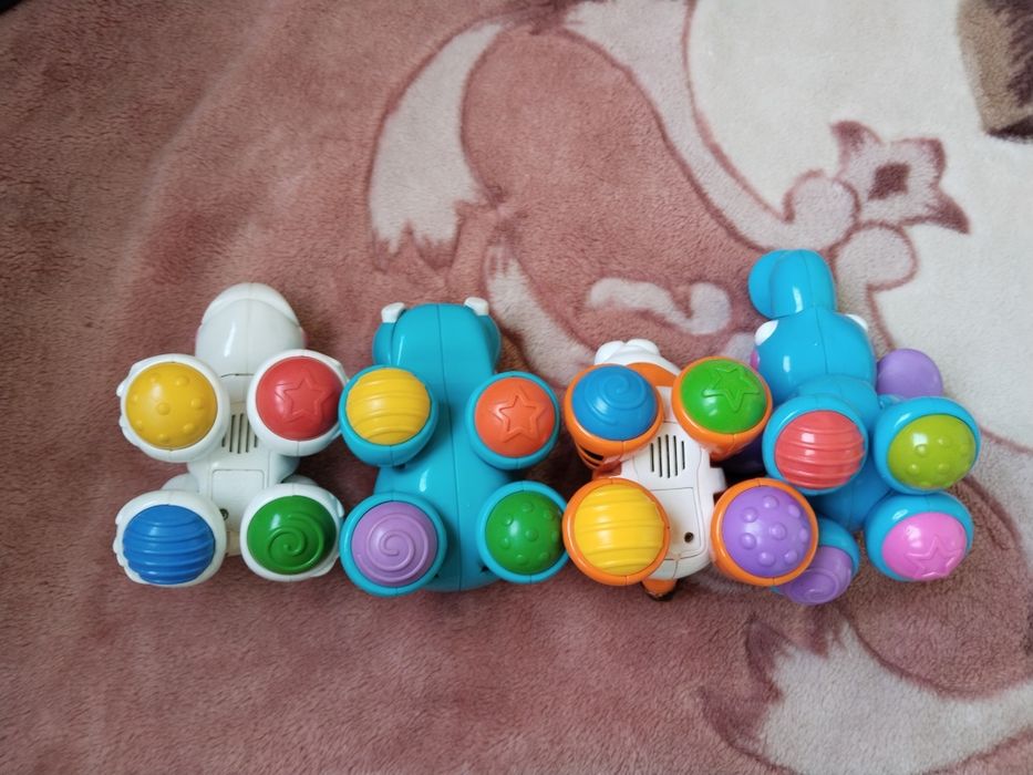 Тріскачки, іграшки - тріскачки, трещетки Fisher Price