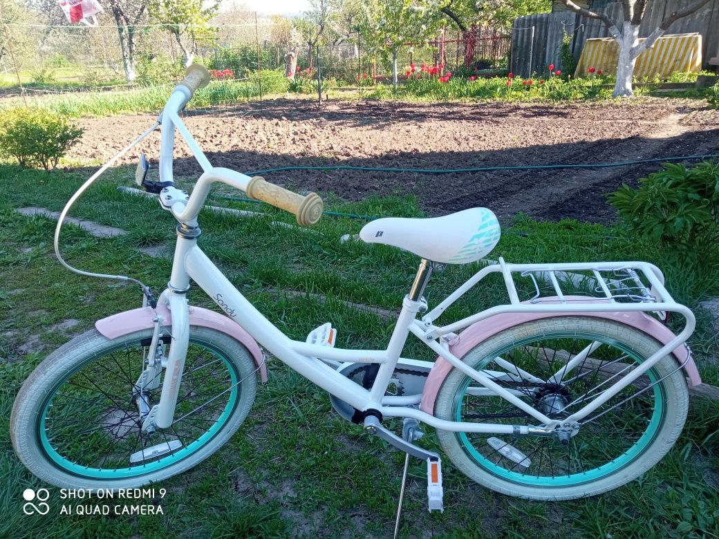 Продам велосипед  20"  бело-розовый глянцевый
