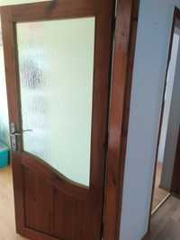 Drzwi wewnętrzne drewniane oszklone używane